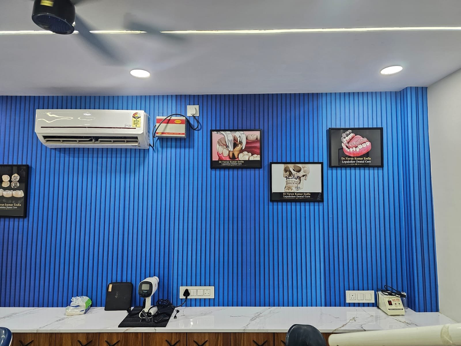 Clean clinic interior with blue feature wall