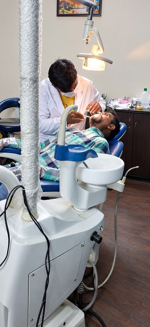 Dentist providing attentive patient treatment